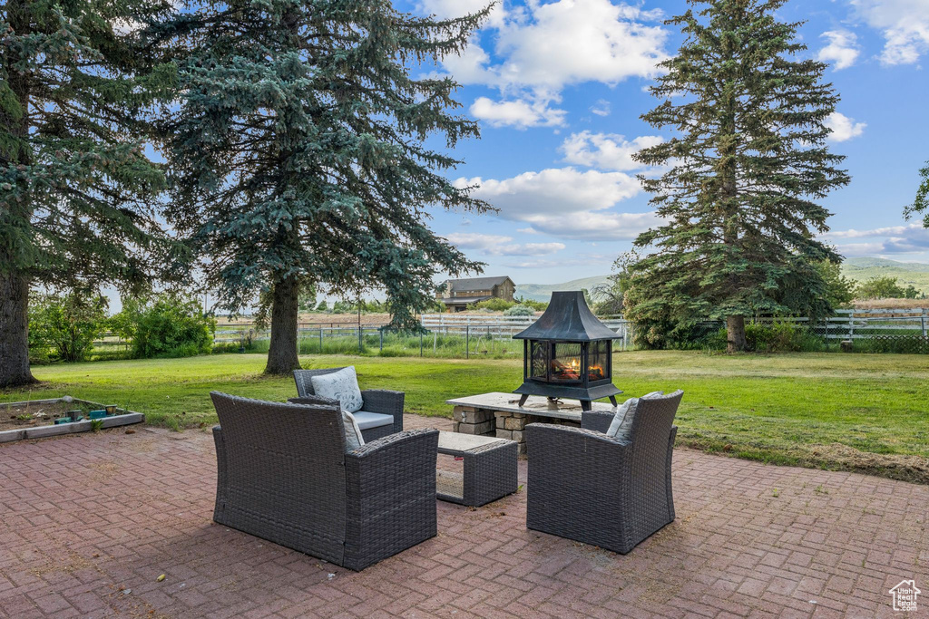 Fenced backyard with a patio area