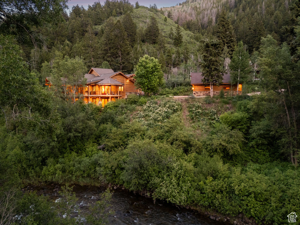 View of yard with a forest view