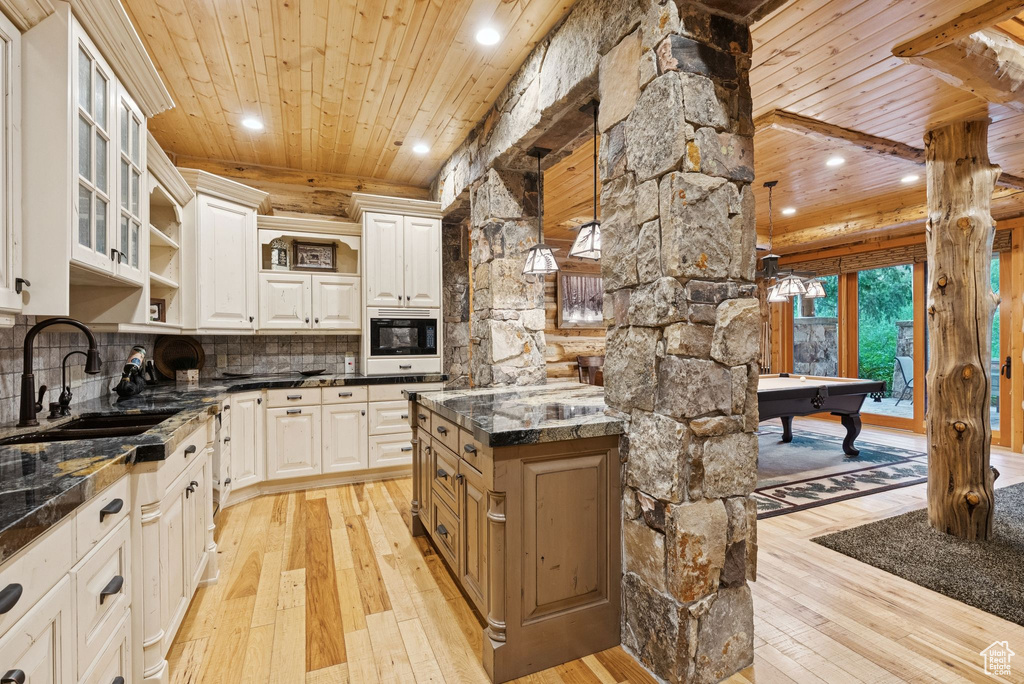 Kitchen featuring wooden ceiling, light wood-style flooring, recessed lighting, billiards table, and decorative backsplash