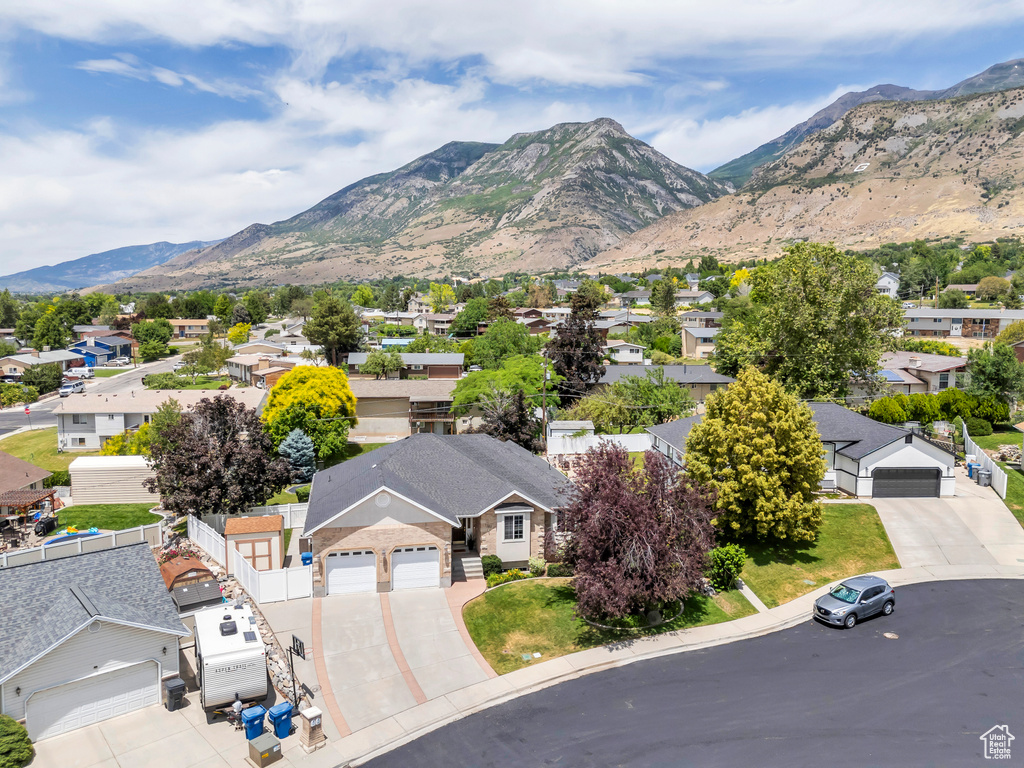View of mountain backdrop with nearby suburban area