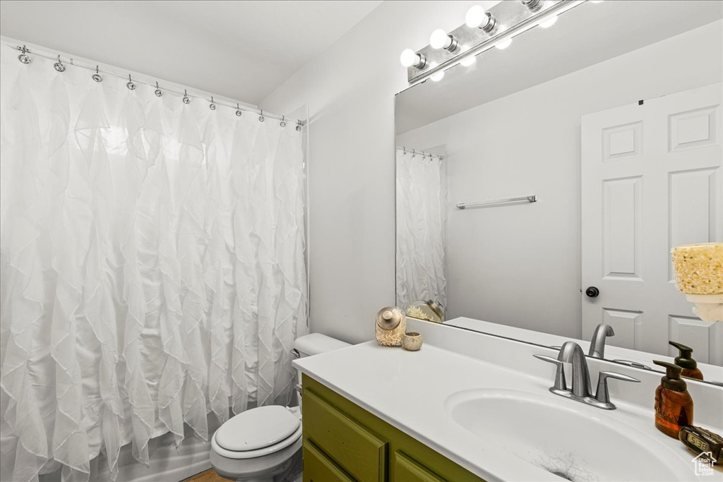 Full bath with vanity and toilet