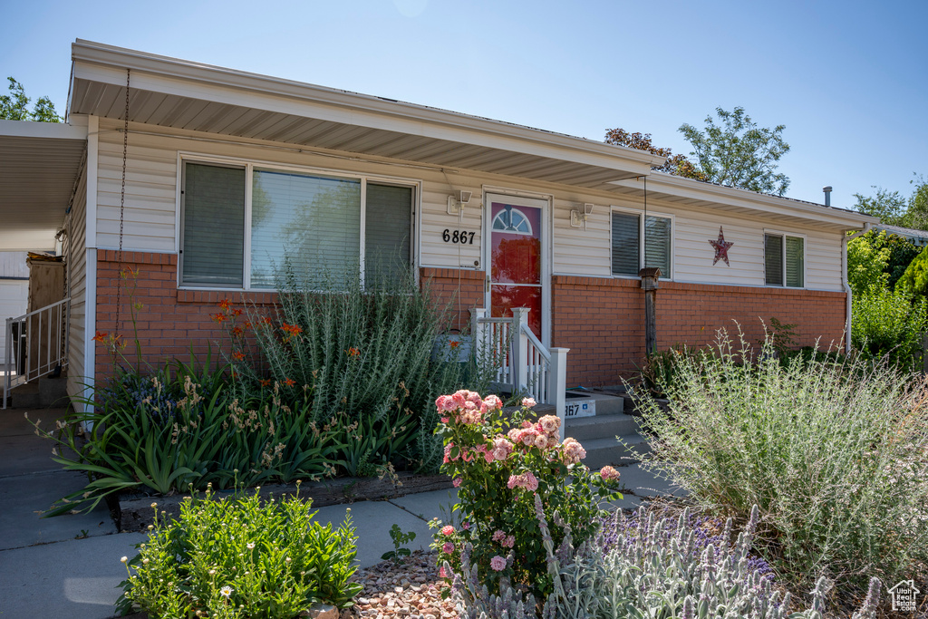 View of front facade featuring brick siding