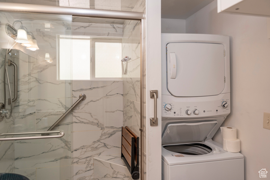 Laundry room with estacked washer and dryer