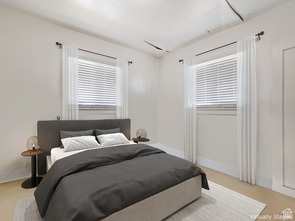 Bedroom with baseboards