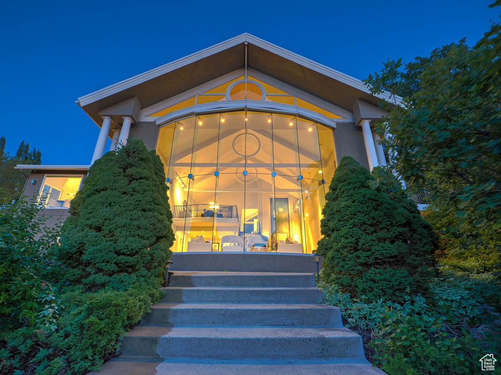 View of exterior entry at night