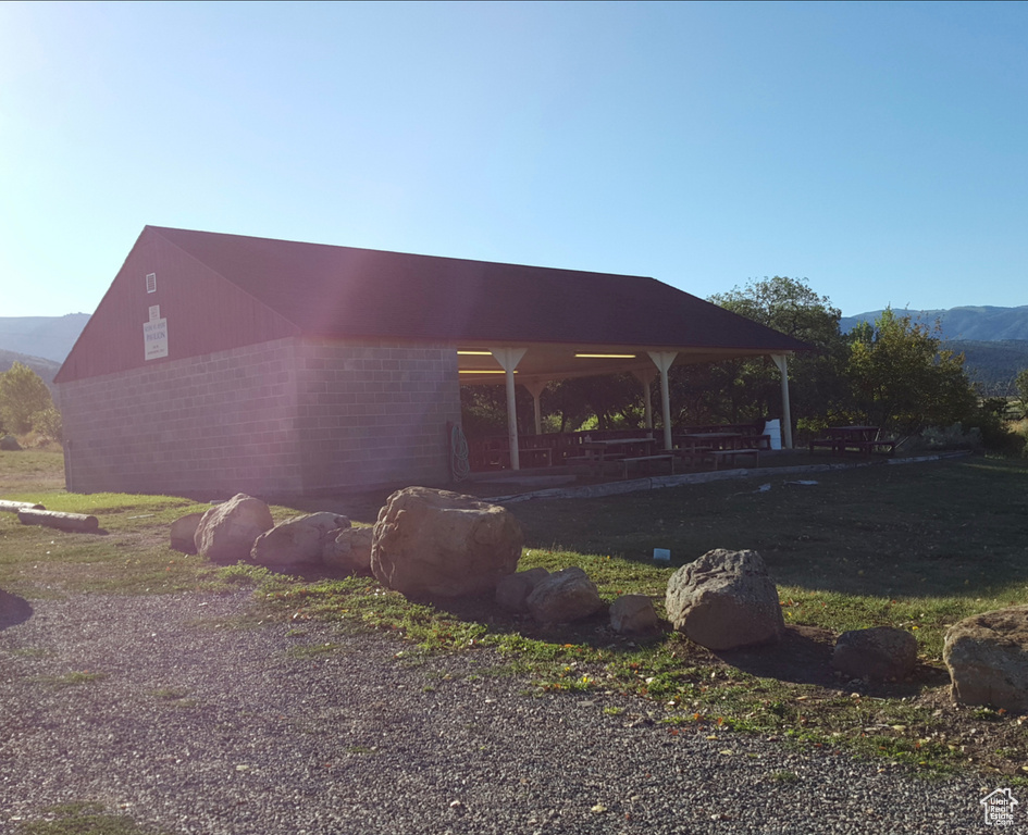 View of side of property featuring a mountain view