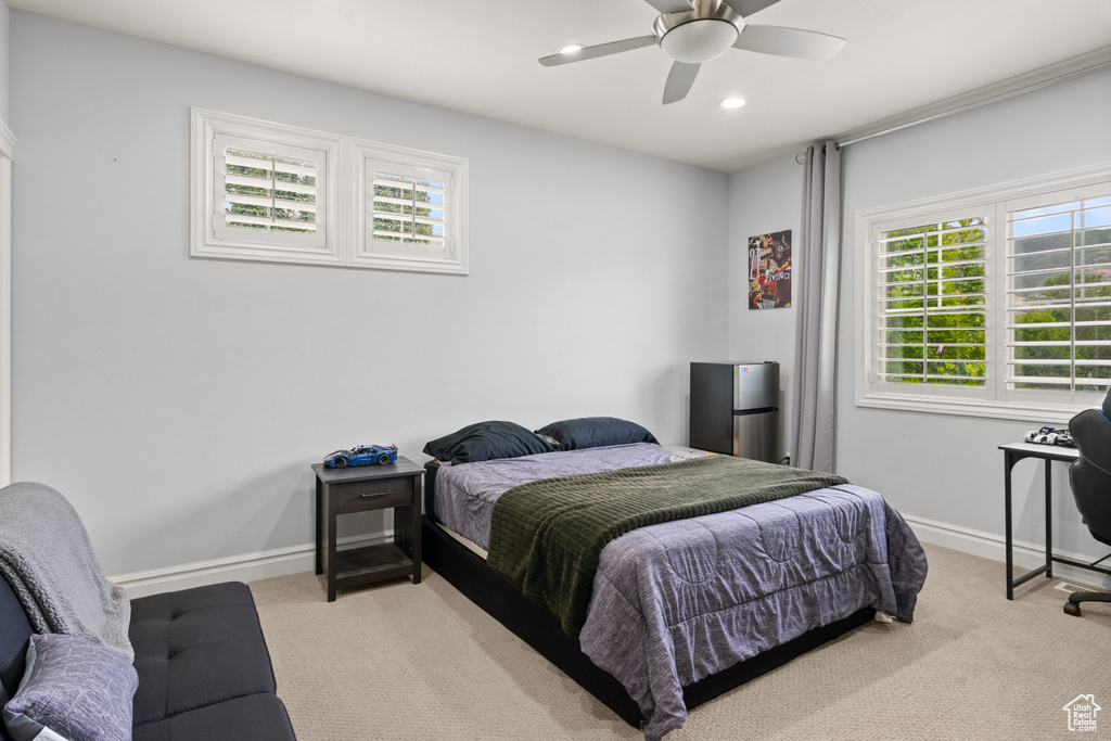 Bedroom featuring carpet floors, recessed lighting, and ceiling fan