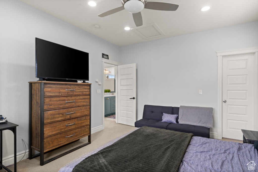 Carpeted bedroom featuring attic access, recessed lighting, a ceiling fan, and baseboard heating