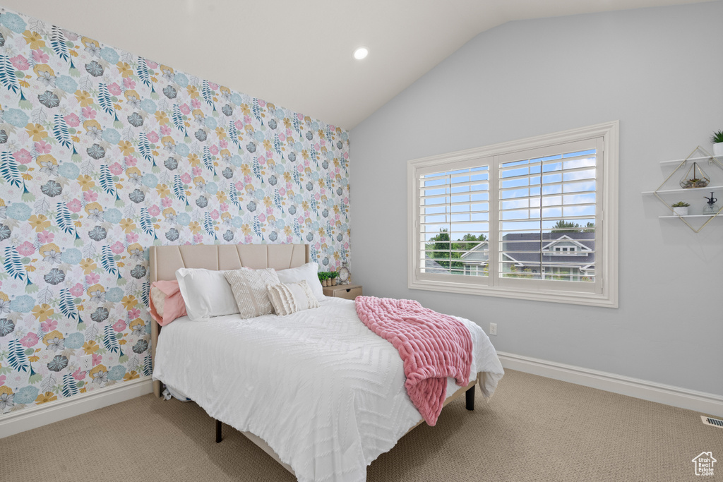 Bedroom featuring lofted ceiling, carpet flooring, and recessed lighting