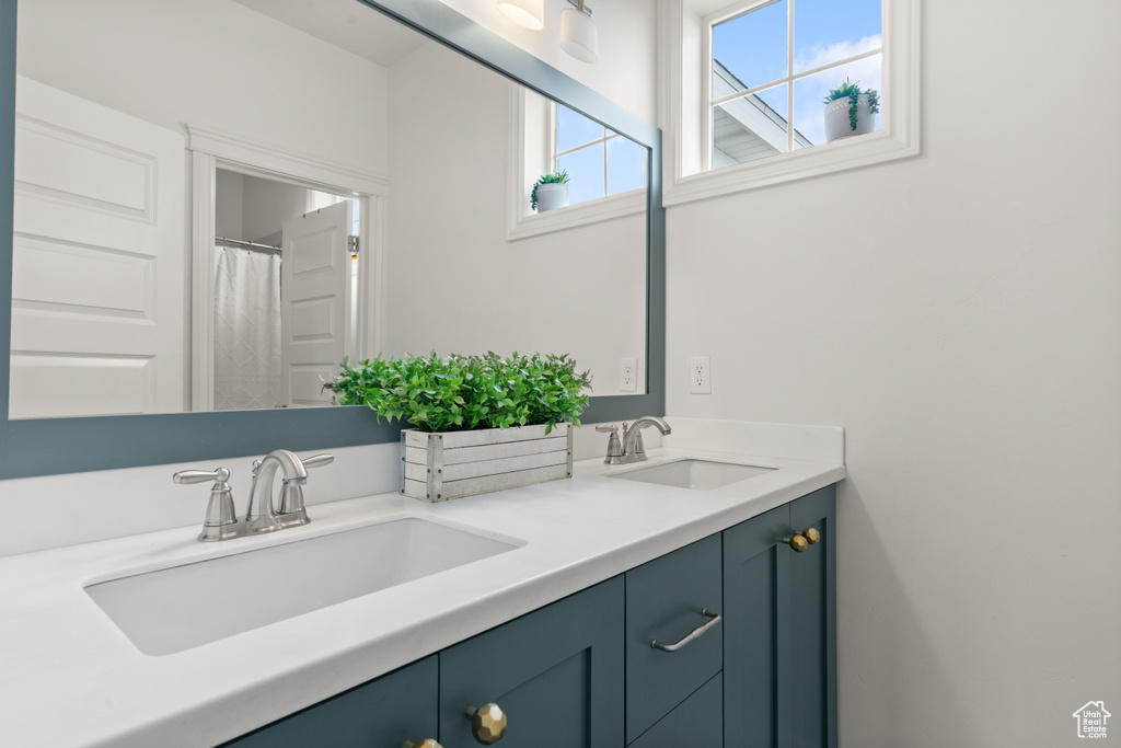 Full bathroom with double vanity