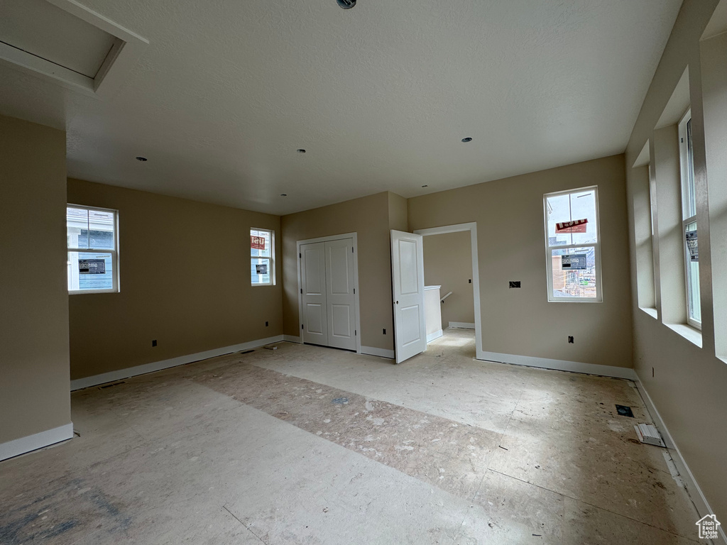 Unfurnished bedroom featuring baseboards