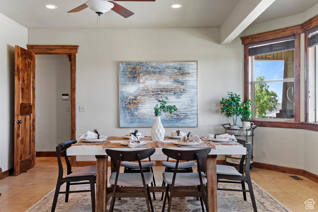 Dining space featuring light tile patterned floors, recessed lighting, and ceiling fan