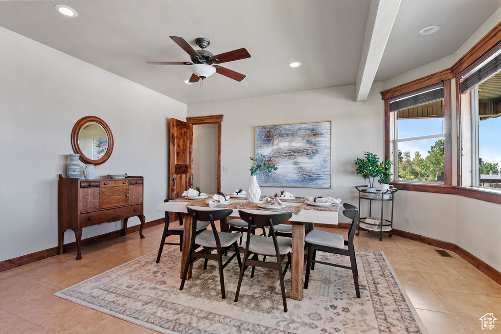 Dining area with recessed lighting, ceiling fan, and light tile patterned floors