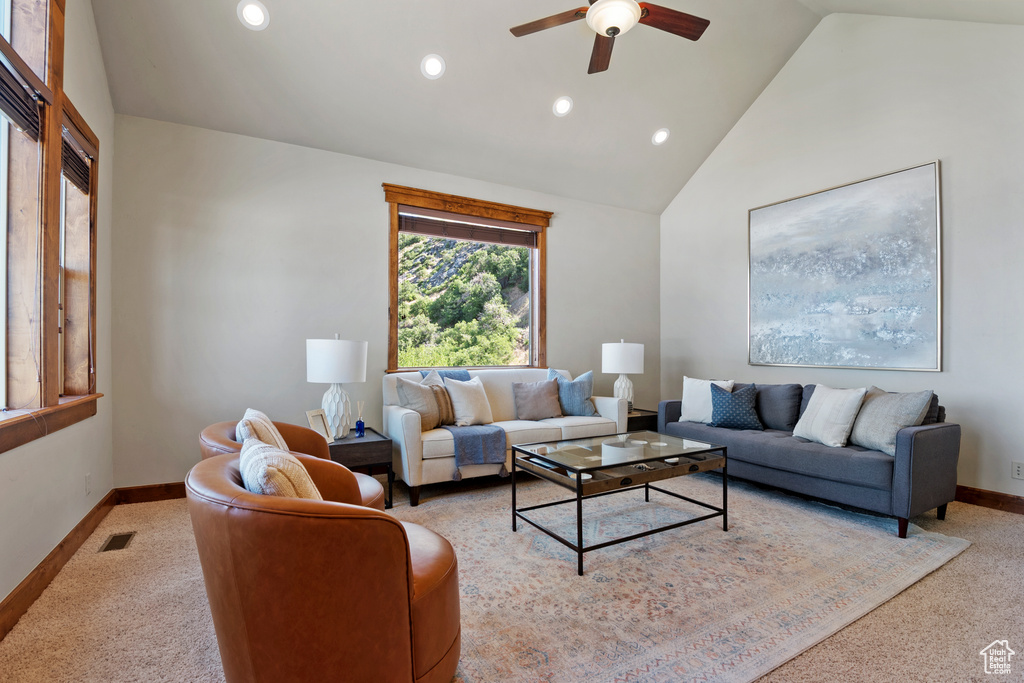 Living room featuring ceiling fan, carpet flooring, recessed lighting, and high vaulted ceiling