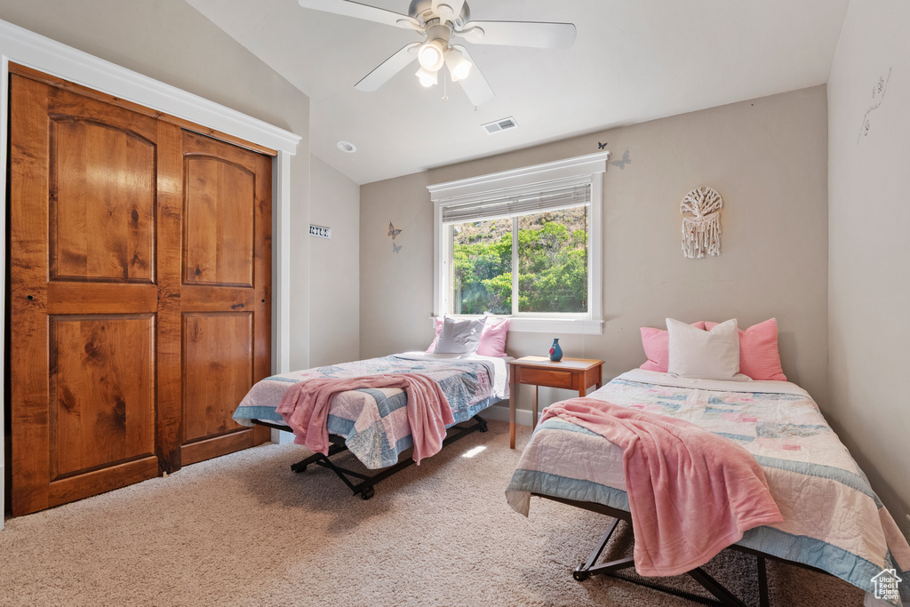 Bedroom with carpet floors and ceiling fan