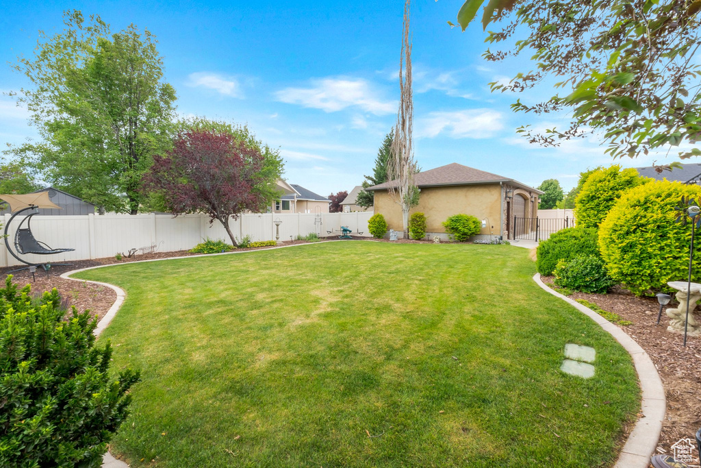 View of fenced backyard