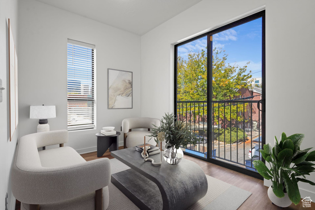 Living area featuring wood finished floors and healthy amount of natural light