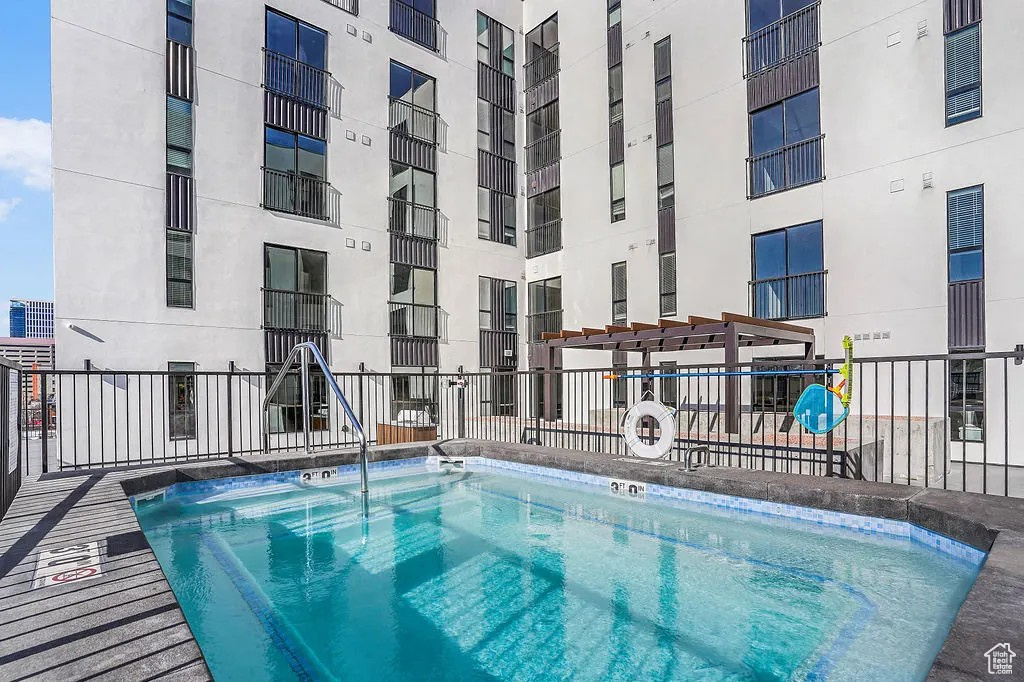 View of swimming pool with a swimming pool