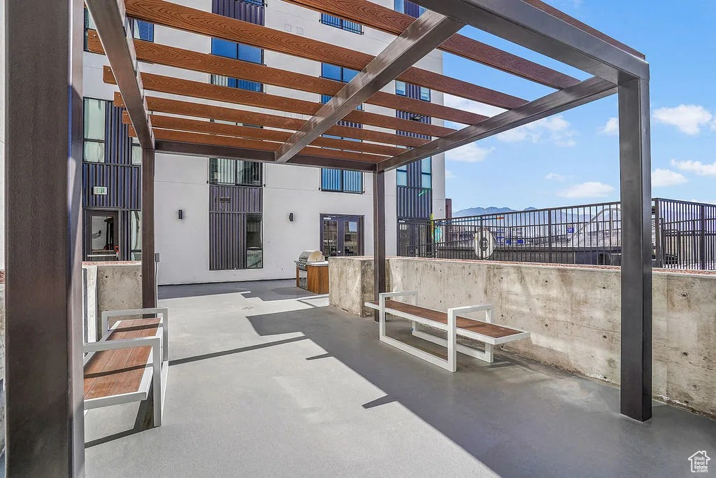 View of patio with a pergola