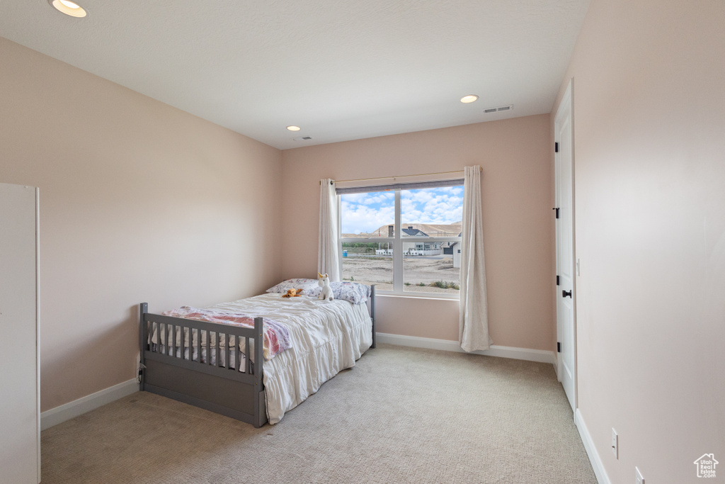 Bedroom with carpet and recessed lighting