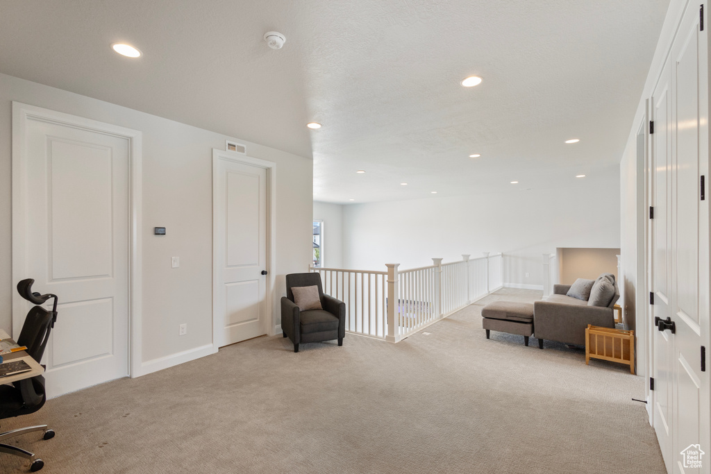 Home office featuring carpet floors and recessed lighting