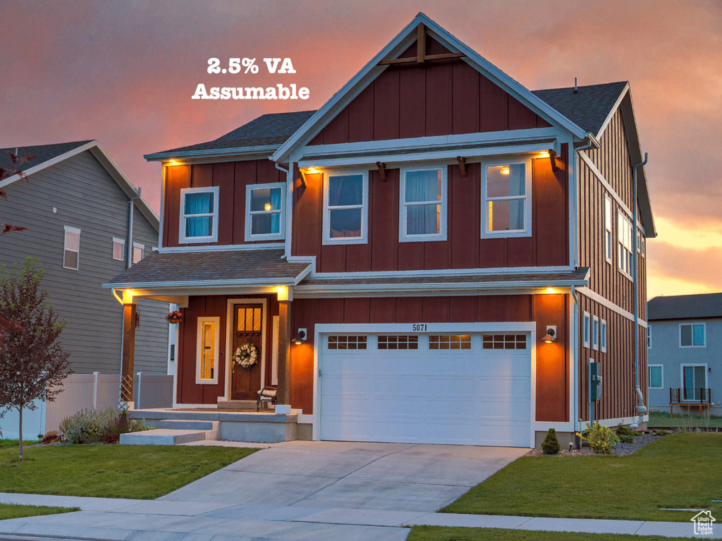 View of front facade with board and batten siding, concrete driveway, a garage, and roof with shingles