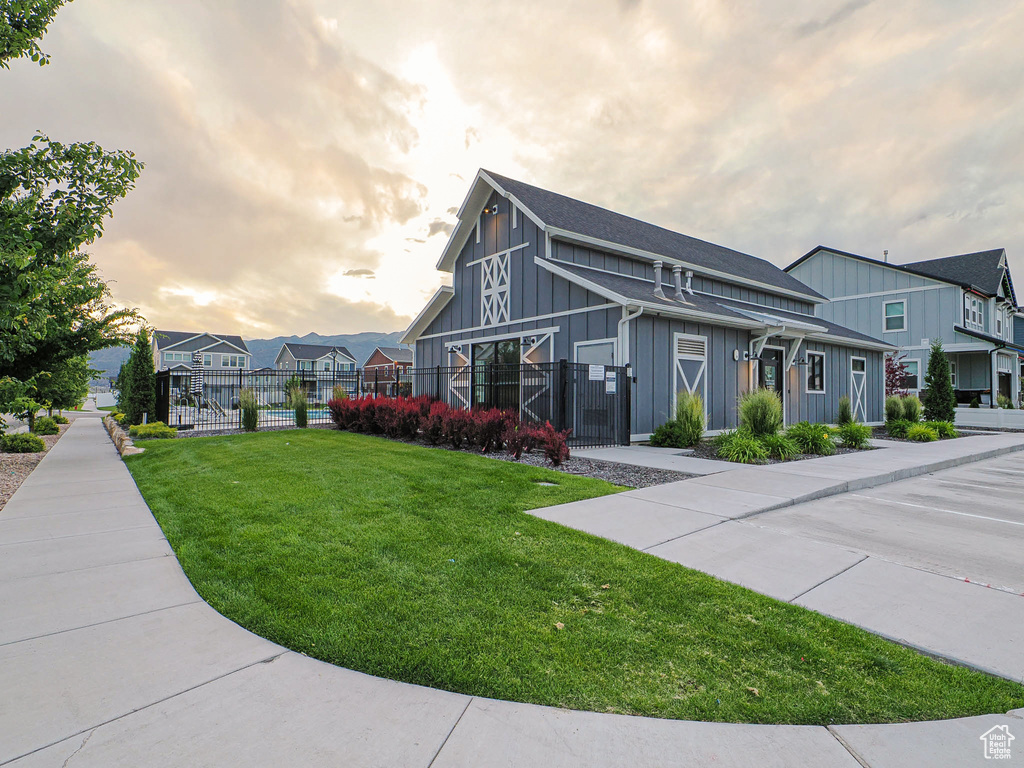 View of property with a residential view