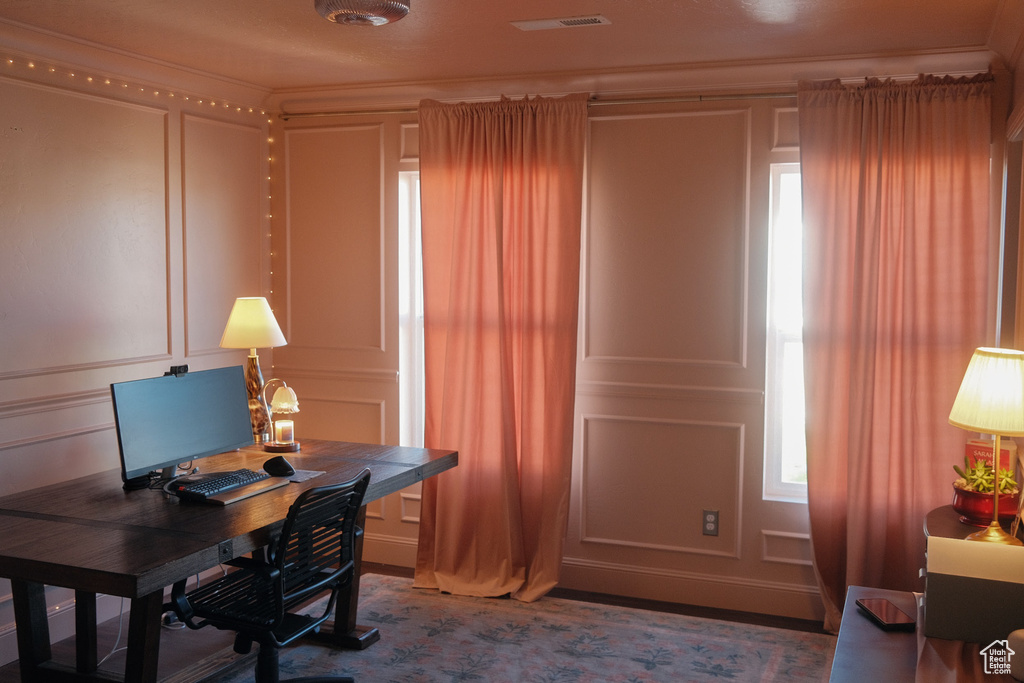 Home office with a decorative wall