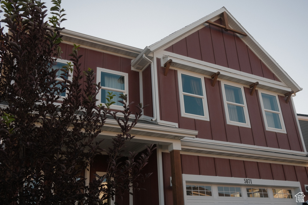 View of front of home featuring a garage