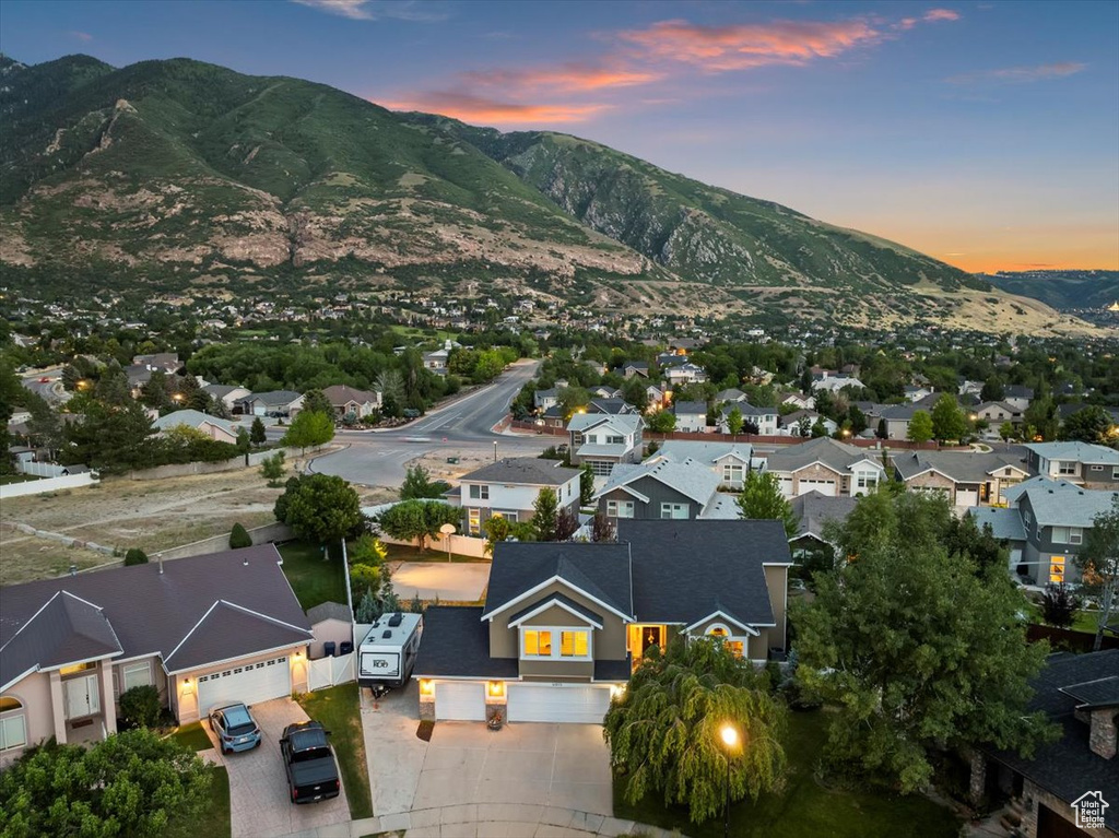 Aerial view at dusk of a mountain view and a residential view
