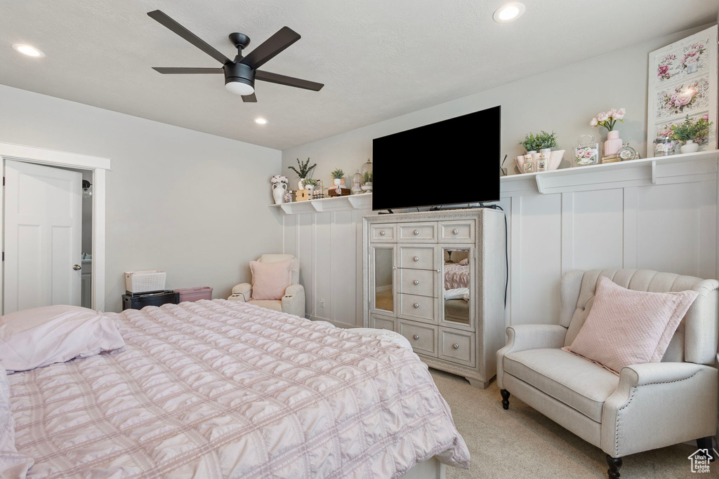 Bedroom featuring light colored carpet, recessed lighting, and a ceiling fan