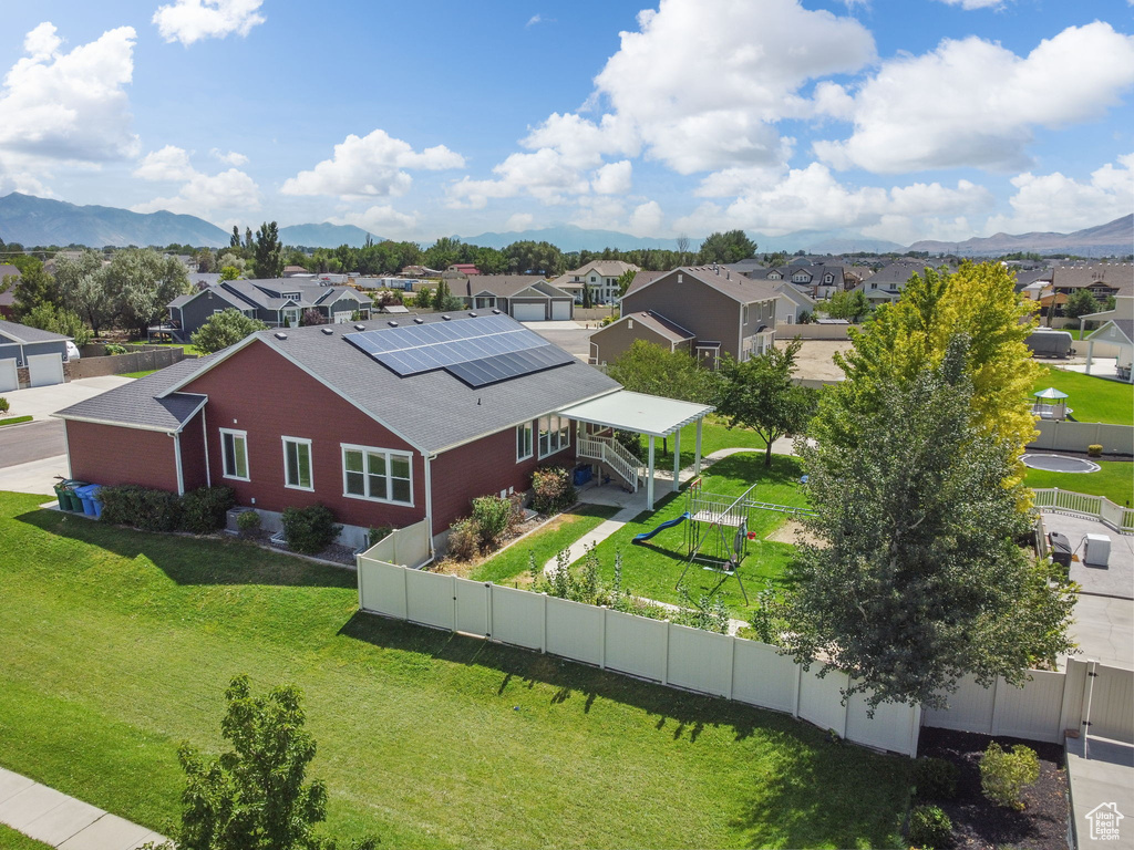 Aerial view of residential area with mountains