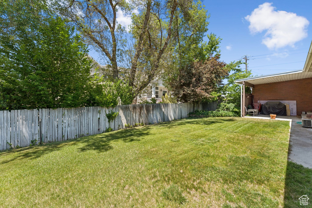 View of fenced backyard