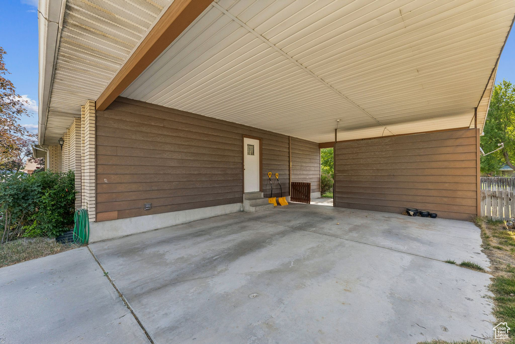 View of patio with an attached carport