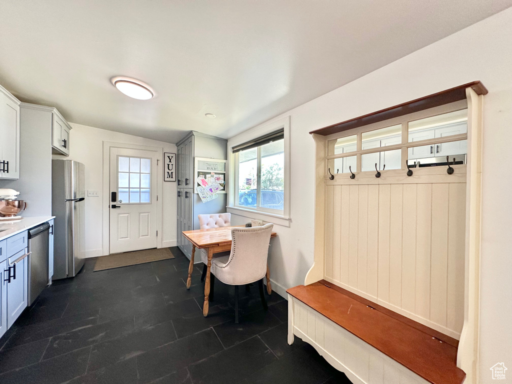 Mudroom featuring healthy amount of natural light