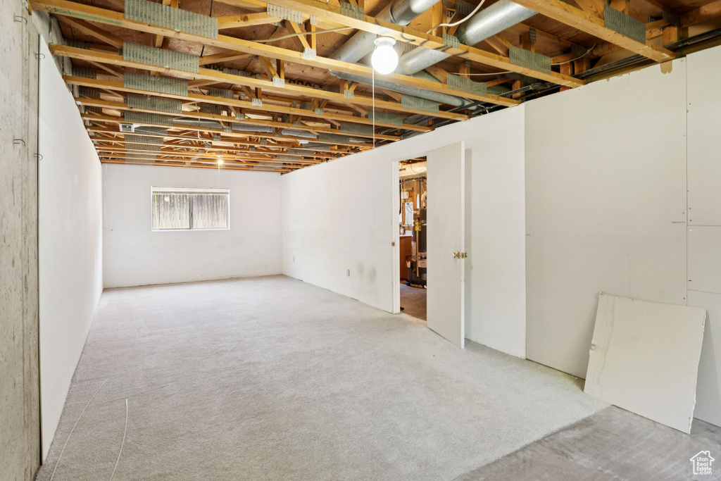 Below grade area featuring carpet floors