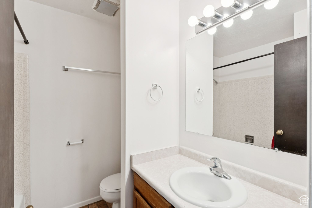 Full bath featuring vanity and a shower