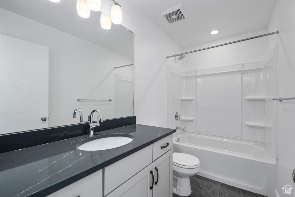 Full bath featuring vanity, bathtub / shower combination, and recessed lighting