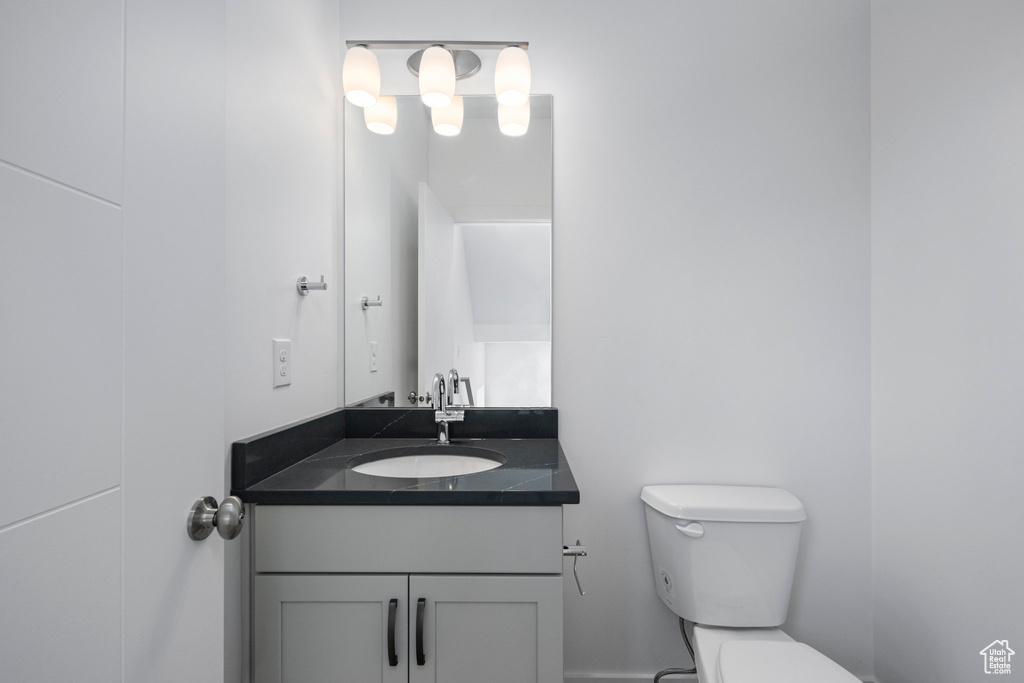 Bathroom featuring toilet and vanity