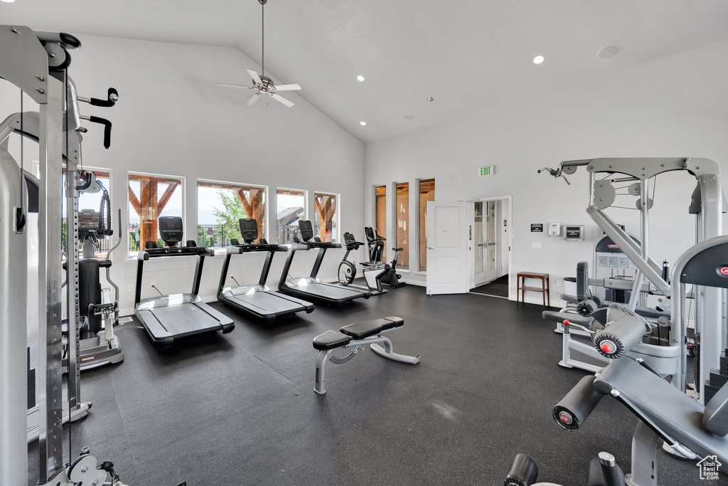 Gym featuring high vaulted ceiling, a ceiling fan, and recessed lighting