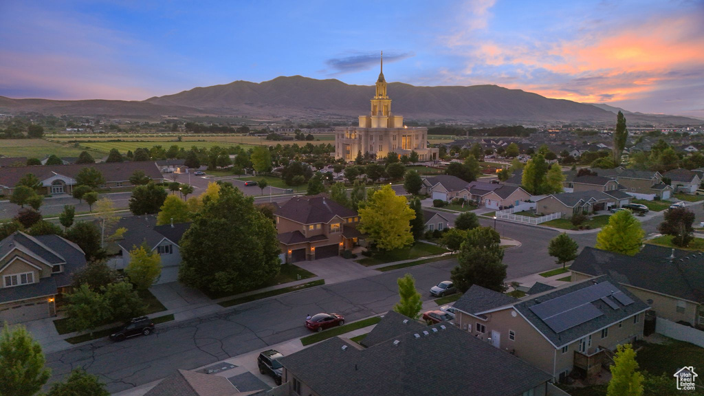 Aerial view at dusk of a mountain view and a residential view
