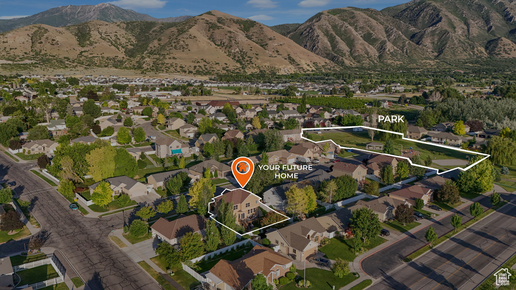 View of property location featuring property boundaries highlighted, a mountain backdrop, and nearby suburban area