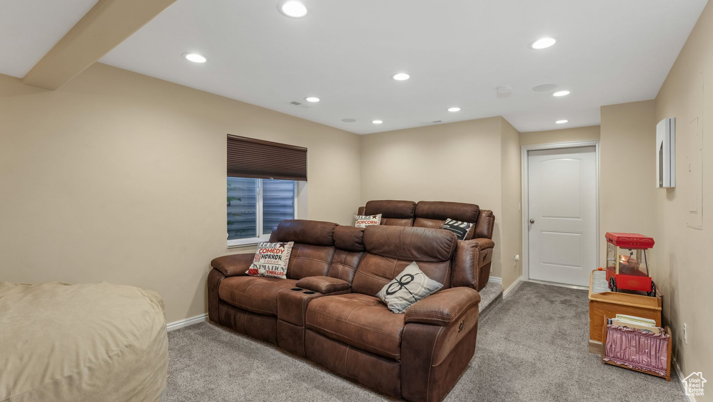 Bedroom featuring light colored carpet and recessed lighting