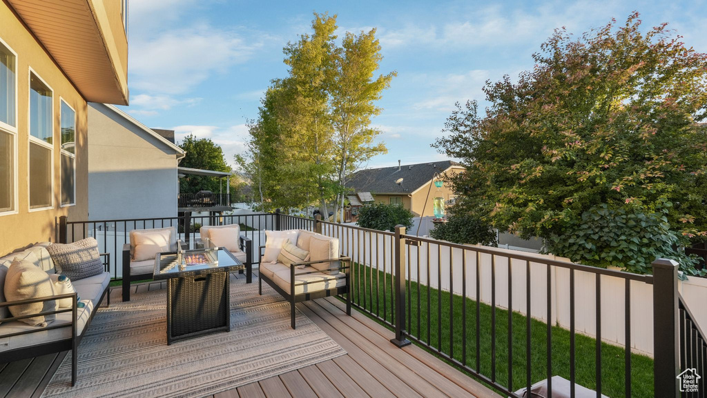 Deck with an outdoor living space