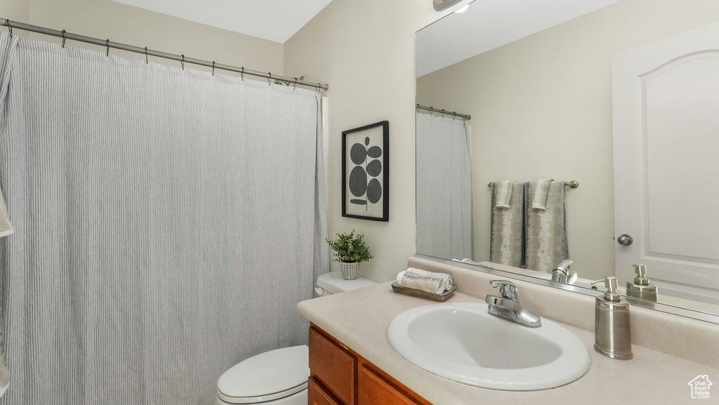Bathroom with vanity and toilet