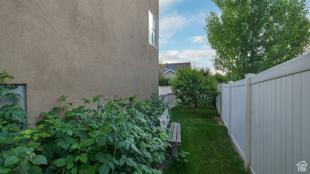 View of fenced backyard