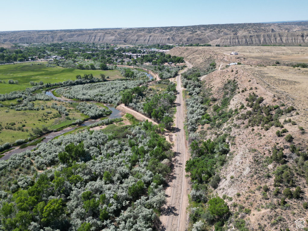 Aerial overview of property\'s location with rural landscape