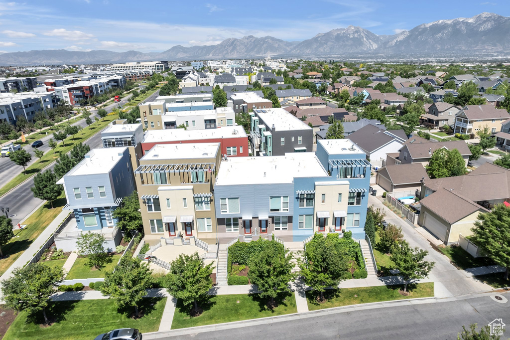 Aerial view of residential area with a mountainous background