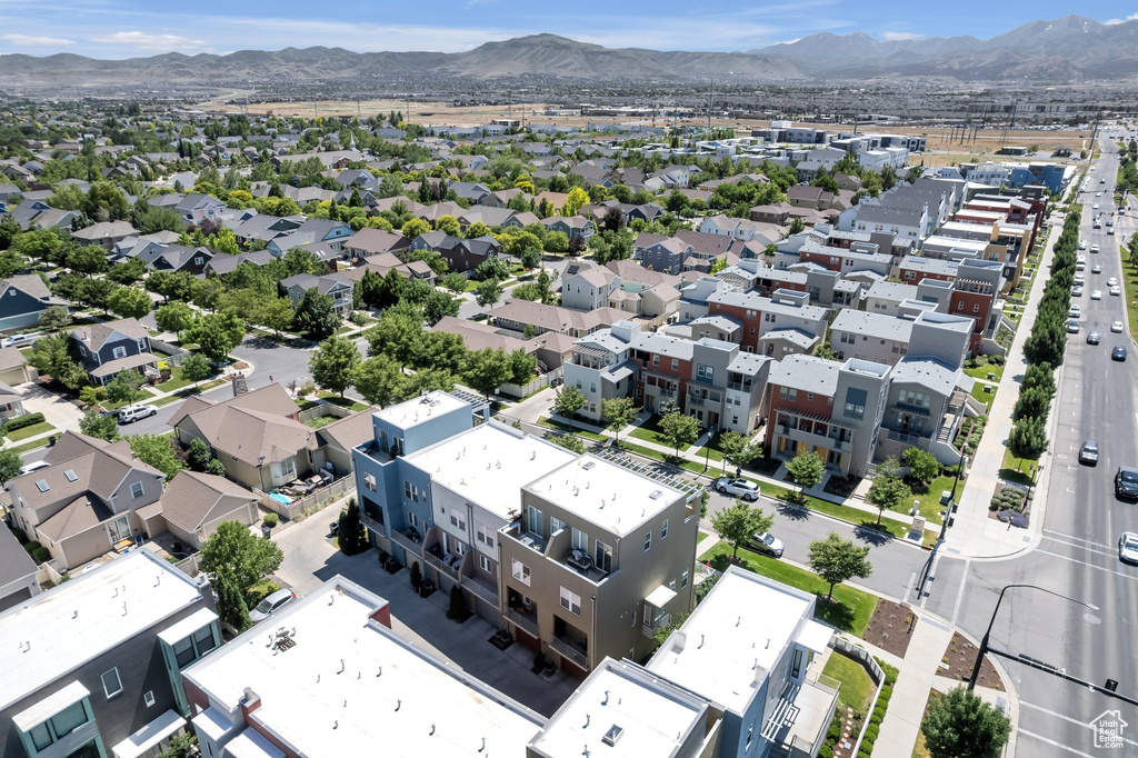 Aerial view of residential area with a mountainous background