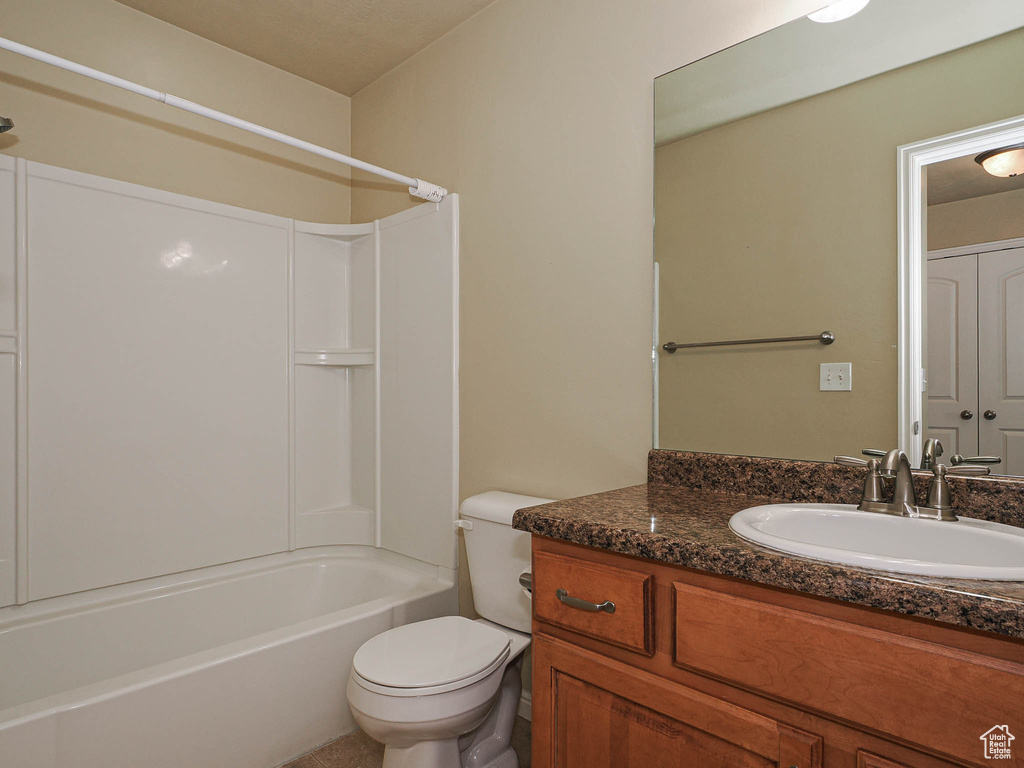 Full bathroom featuring vanity and washtub / shower combination